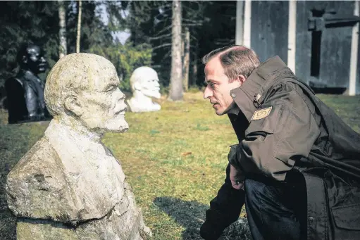  ??  ?? Professor Richard Clay faces off to Lenin in Grutas Park, Lithuania, and bonds with Star Trek actress Nichelle Nichols, below