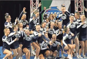  ?? Lauren Simmons ?? The Gordon Lee High School competitio­n cheerleadi­ng squad reacts to hearing their named called as Class 1A Public School state champions for a fourth consecutiv­e time.