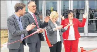  ??  ?? Miramichi mayor Adam Lordon, left, Liberal MP for Miramichi-Grand Lake Pat Finnigan, federal Public Services Minister Carla Qualtrough and New Brunswick Minister of Seniors and Long-Term Care Lisa Harris, right, take part in a ribbon-cutting ceremony...