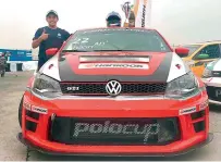  ??  ?? Ishan Dodhiwala gives a thumbs up as he poses next to his car.