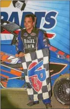  ?? PHOTO COURTESY ACTION TRACK USA ?? Pottstown’s Tim Buckwalter stands in victory lane after a win last season at Action Track USA.