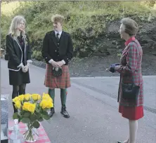  ??  ?? Head girl Hannah Crowe and head boy Angus Files showed the Princess around Oban High School campus.