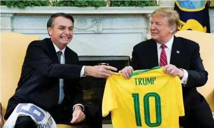  ?? Photograph: Kevin Lamarque/Reuters ?? Brazil’s Jair Bolsonaro at the White House with Donald Trump. ‘A host of ludicrous strongmen dominate nations that would once have laughed them off stage.’