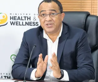  ?? FILE ?? Minister of Health and Wellness Dr Christophe­r Tufton.