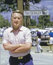  ?? Jayne Kamin Los Angeles Times ?? VIN SCULLY near his namesake street in Vero Beach, Fla., during the Dodgers’ 1985 spring training.