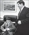  ?? KEN WILLIAMS/AP ?? Young Chris Sununu sits in his dad’s chair at the Statehouse in Concord, N.H. His father, Gov. John H. Sununu, told his son he’d have to run for the seat to sit in it.