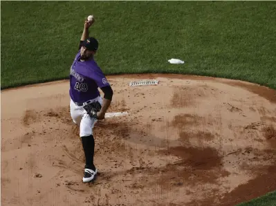  ?? David Zalubowski, The Associated Press ?? Rockies starting pitcher Antonio Senzatela throws at Coors Field on Sunday.