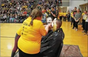  ?? COURTESY OF BASH CUB ?? Mr. Maoury and Mr. Turner tied for second place, both getting pies in the face.