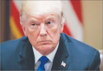  ?? AP PHOTO ?? President Donald Trump pauses during a meeting in the Cabinet Room of the White House with members of Congress to discuss school and community safety.