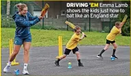  ?? ?? Emma Lamb shows the kids just how to bat like an England star