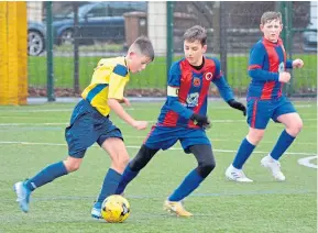  ??  ?? Monifieth Athletic (red/blue) lost 2-0 to Milton in an U/13 Scottish Cup clash at Craigie 3G.