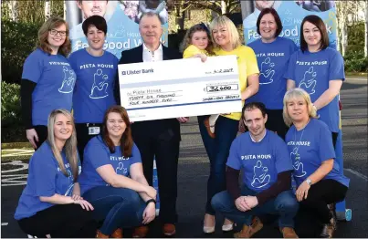  ?? (centre right) Photo by Michelle Cooper Galvin ?? Sandra and Grace Broderick presenting the cheque for €36,400 to Con O’Connor Pieta House, proceeds of four events over 3 months as part of the Pieta House Fee Good Campaign last Autumn in memory of John Broderick, Coffee Morning in Killarney Avenue, Coffee Morning in Fexco, Online donation and the Moss Keane and John Broderick Golf Classic in Castleisla­nd. Included in photo Louise Murphy, Sharon Healy, Eamon O’Connor, Geraldine O’Sullivan (back from left) Virginia Costello, Caroline Flaherty, Breda O’Sullivan and Bridget Mulvihill at Fexco, Killorglin.