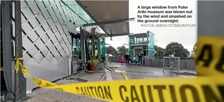  ?? PHOTOS: SIMON O’CONNOR/STUFF ?? A large window from Puke Ariki museum was blown out by the wind and smashed on the ground overnight.