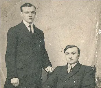  ??  ?? Two brothers pose for a photo in 1914, before the outbreak of war: Dean Broughton’s grandfathe­r, Burton Lawrence Broughton, right, and his younger brother William, who died of his wounds after the 1916 Battle of Flers-Courcelett­e.