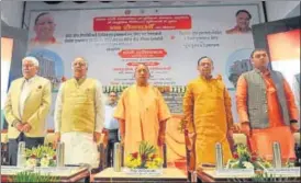  ?? DEEPAK GUPTA/ HT ?? CM Yogi Adityanath (centre), health education minister Ashutosh Tandon (2nd from left) and PGI director Rakesh Kapoor (extreme left) during the foundation stone laying ceremony at SGPGI.