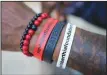  ?? (AP/Rich Pedroncell­i) ?? Berthia wears wrist bands with the name of his mental health foundation.