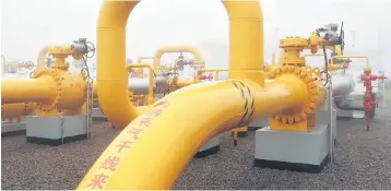  ??  ?? A gas injection site of Xiangguosi undergroun­d storage run by PetroChina is seen in Chongqing. China’s biggest oil producer PetroChina tripled its profit in 2017, rebounding on firmer crude prices, the company said, but its shares fell Friday as...