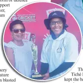  ?? ?? Elzaan Pietersen, the captain of the Sussex Ladies, receiving the trophy from Katrisha Strydom, SWD Cricket board member.