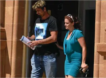 ??  ?? MATTER AJOURNED: Roberto Gabriel Calvisi (left) leaves Warwick Magistrate­s Court after his matter related to unlawful possession of weapons was adjourned.