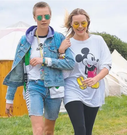  ?? Picture: INSTAGRAM ?? Cara Delevingne (left) and Margot Robbie enjoy the day out at the Glastonbur­y Festival.