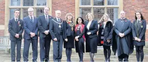  ??  ?? ●●At the Remembranc­e service at Stockport Grammar School are, from left, head boy Samuel Howard; chair of governors Chris Dunn; William Wragg MP; Ken Holt, the Mayor’s consort; mayor of Stockport Coun Linda Holt; Dr Robina Shah, deputy lieutenant of...