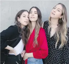  ?? TAYLOR JEWELL/THE ASSOCIATED PRESS ?? Alana Haim, left, Danielle Haim and Este Haim of the music group Haim are executing their own vision.