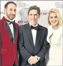  ??  ?? Rob Brydon with Strad and Gina Kyriacou of Chris’s Fish and Chips in Barwell at last year’s event