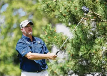  ?? GETTY IMAGES
Associated Press ?? Boo Weekley (watching his drive at the sixth hole during Saturday’s third round) played his way into today’s final pairing of the Travelers Championsh­ip with Jordan Spieth at TPC River Highlands in Cromwell, Conn.