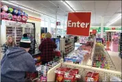  ?? Photo by Brian D. Stockman ?? While there were lines, the dedicated employees of Dollar TreeFamily Dollar got everyone checked out quickly on Saturday.