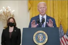  ?? Manuel Balce Ceneta/Associated Press ?? President Joe Biden speaks about the evacuation of American citizens, their families, SIV applicants and vulnerable Afghans in the East Room of the White House, Friday in Washington. Vice President Kamala Harris listens at left.