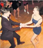  ??  ?? Fun time Callum Shimmins and Emily Fraser at the seniors’ dance