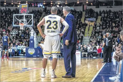  ?? ST. JOHN’ EDGE PHOTO/JEFF PARSONS ?? St. John’s Edge star Carl English and head coach/general manager Jeff Dunlap (right) will meet with the local press this morning two days after the Edge’s NBL Canada season ended with a playoff loss to the London Lightning. There is no guarantee either...