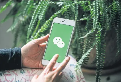  ??  ?? LEFT
WeChat is a lifeline for thousands of Americans seeking to stay in touch with family and friends in China.