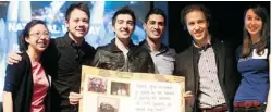  ?? JULIE OLIVER/OTTAWACITI­ZEN ?? Rock singers Neverest (including members Spyros ‘Spee’ Chalkiotis, Mike Klose and Paul Loduca) accept a big thank you card with Craig Kielburger (second from right) and Hillcrest students Caitlin Salvino, 17 (far right) and Rebecca Wong, 16 (far left)...