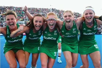  ?? CHRISTOPHE­R LEE/GETTY IMAGES ?? Nicola Evans, Yvonne O’Byrne, Zoe Wilson, Kathryn Mullan and Hannah Matthews celebrate after Ireland’s victory over India in the Women’s Hockey World Cup quarter-final
