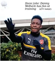  ?? GETTY IMAGES ?? Snow joke: Danny Welbeck has fun at training