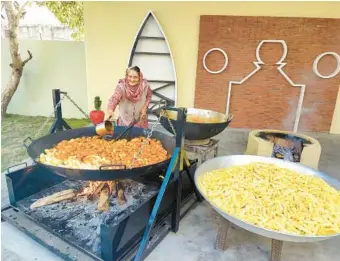  ?? VEG VILLAGE FOOD ?? More than 5 million followers tune in to a web series where they can watch Amar Kuar cook food from the simple setup in her family’s courtyard in her village in India.