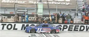  ?? RANDY SARTIN/USA TODAY SPORTS ?? Driver Denny Hamlin crossed the finish line first Sunday at the end of the Food City 500 at Bristol Moor Speedway. The victory was his first this year and his 52nd in the NASCAR Cup Series.