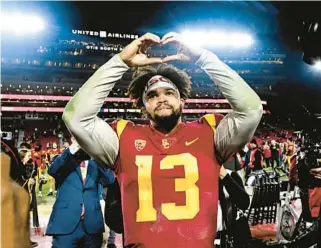  ?? TRIBUNE CONTENT AGENCY ?? USC’s Heisman Trophy-winning quarterbac­k Caleb Williams said the Dolphins are his top choice if he leaves for the NFL next year.