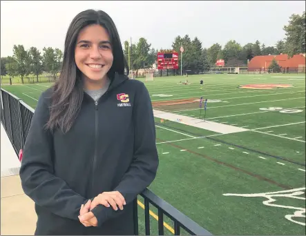 ?? MARK PODOLSKI — THE NEWS-HERALD ?? Alex Hanna is one of the nation’s few female college football assistant coaches after recently being hired as director of football operations and cornerback­s coach at Oberlin College.
