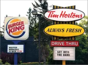  ?? CANADIAN PRESS FILE PHOTO ?? Restaurant Brands Internatio­nal, owner of Burger King, Tim Hortons and Popeyes, says it earned US$91.4 million in its latest quarter.