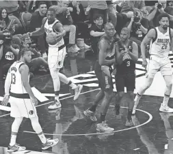  ?? PATRICK BREEN/THE REPUBLIC ?? The Suns’ Chris Paul (3) tells the Mavericks bench to take a timeout after he scored during the second half of Game 2 in their Western Conference semifinal series on Wednesday night in Phoenix.