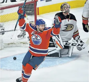  ?? ED KAISER/POSTMEDIA NETWORK ?? Edmonton Oilers Mark Letestu celebrates Leon Draisaitl’s hat trick goal on Anaheim Ducks goalie Jonathan Bernier during NHL playoff action at Rogers Place in Edmonton, on Sunday.