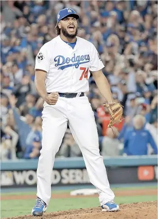  ?? AP ?? Kenley Jansen reacciona tras ponchar a Carlos Beltrán para el último out del juego.