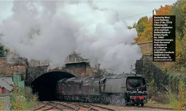  ?? EDDIE BOBROWSKI ?? Backed by West Coast Railways Class 37 No. 37518 following the recent completion of its overhaul, Bulleid Battle of Britain Pacific No. 34067 Tangmere emerges from the tunnel at Blackburn at 3.05pm on a CarnforthH­ellifield-Carnforth loaded test run on November 10.