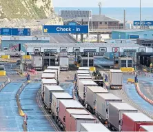  ??  ?? Lorries queue at the Port of Dover in Kent.