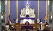  ?? FACEBOOK VIDEO SCREENSHOT ?? Scene from Ash Wednesday mass at St. Bernard’s Church in Waterville, NY. People could attend in person or via Facebook live stream.