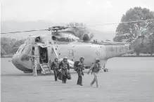  ?? CANADIAN FORCES ?? Senior multinatio­nal military officers, including Cmdr. Clive Butler from HMCS Vancouver, arrive in Kaikoura, New Zealand, to determine how the nations can assist New Zealanders and Kaikoura following the earthquake.