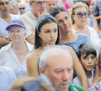  ?? Picture / AP ?? People in Cambrils observe a minute’s silence for the victims of yesterday’s attacks.