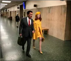  ??  ?? Cicely Ann Hansen (right) walks with her attorney Bill Fazio outside court at the Hall of Justice in San Francisco on Monday. Hansen, the owner of a San Francisco vintage clothing store, pleaded guilty to misdemeano­r charges of selling coats and other...